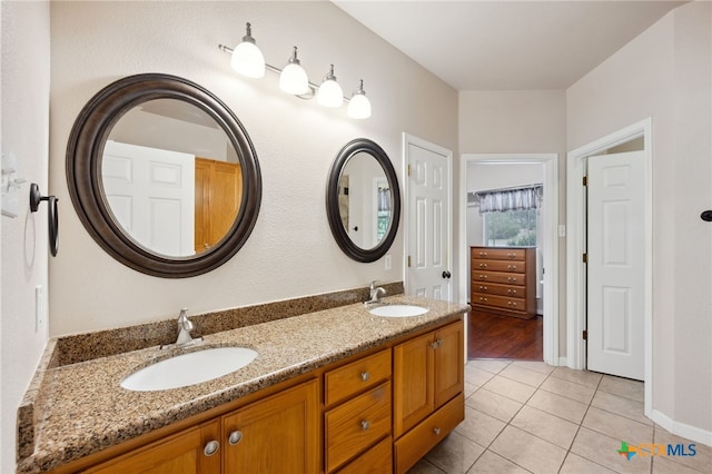 460 Shayla Ln, Canyon Lake, TX 78133 - bathroom with double vanity and tile patterned flooring