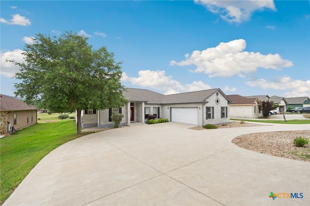 460 Shayla Ln, Canyon Lake, TX 78133 - view of front of home featuring curved driveway, a front lawn, a garage, and a residential view