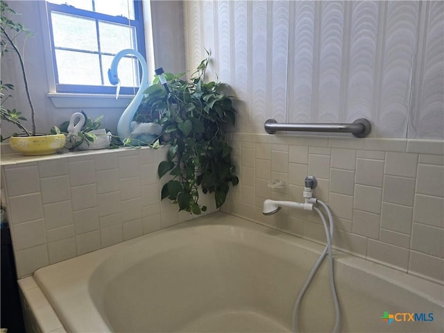 bathroom featuring a bathing tub