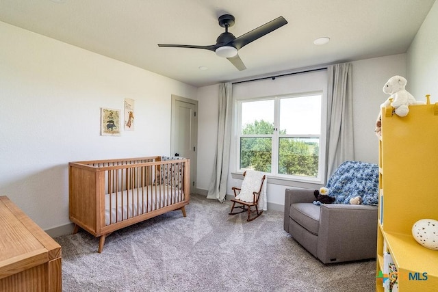13852 Knob Hill Rd, Rogers, TX 76569 - bedroom with carpet floors, a crib, baseboards, and a ceiling fan