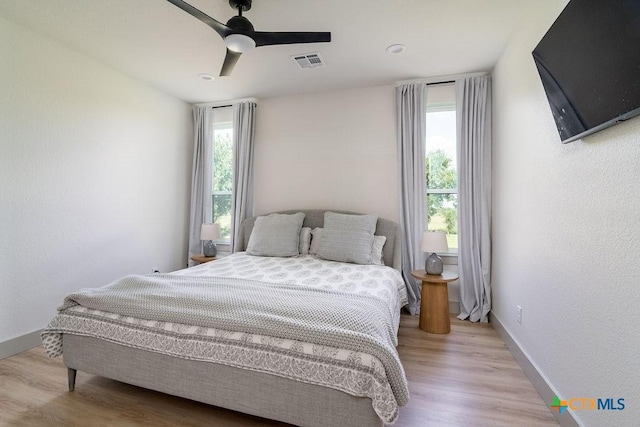 13852 Knob Hill Rd, Rogers, TX 76569 - bedroom featuring baseboards, light wood-type flooring, and a ceiling fan