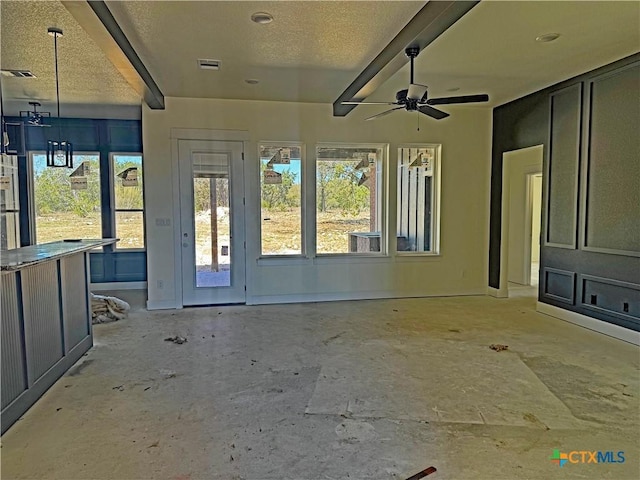 view of patio with visible vents and a ceiling fan