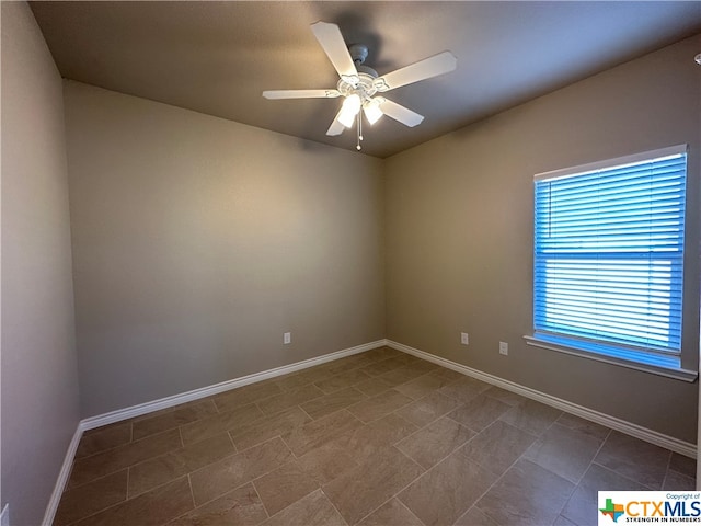 spare room featuring ceiling fan