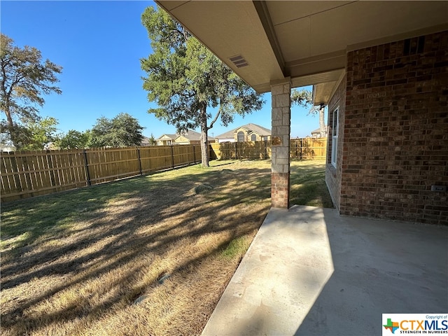 view of yard featuring a patio