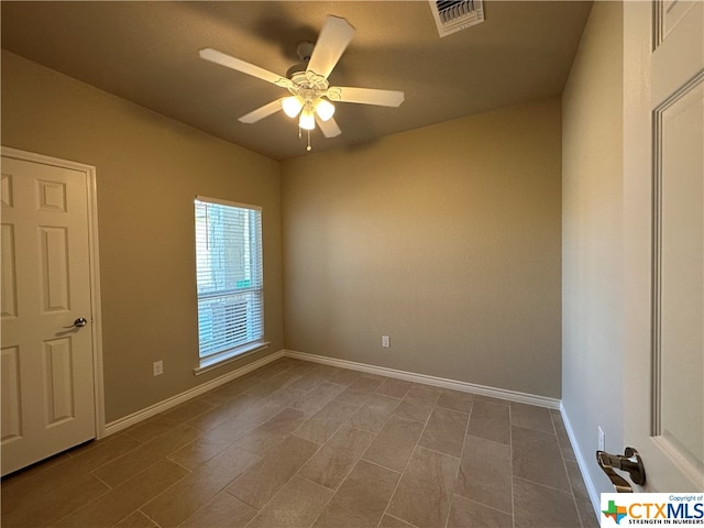 unfurnished room featuring ceiling fan