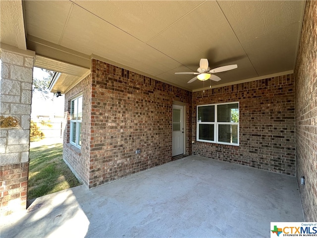 view of patio / terrace featuring ceiling fan