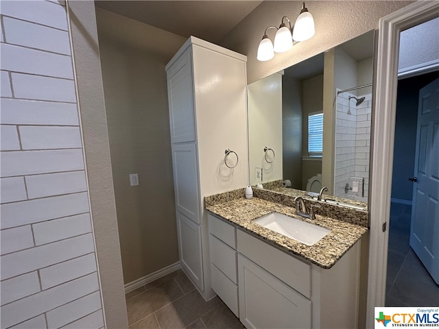 bathroom featuring vanity and tile patterned floors