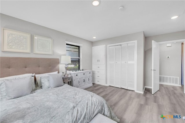 735 Slawson Ln, Killeen, TX 76542 - bedroom featuring wood finished floors, recessed lighting, a closet, and baseboards