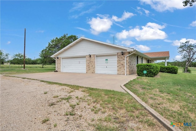 735 Slawson Ln, Killeen, TX 76542 - view of front of house featuring concrete driveway, brick siding, and a front yard