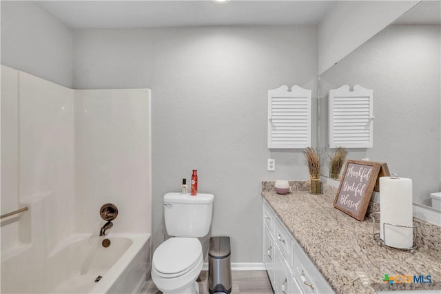 735 Slawson Ln, Killeen, TX 76542 - full bathroom with toilet, vanity, and shower / washtub combination