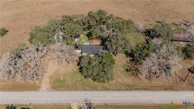 birds eye view of property with a rural view