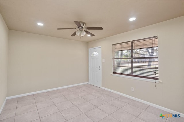 empty room featuring ceiling fan