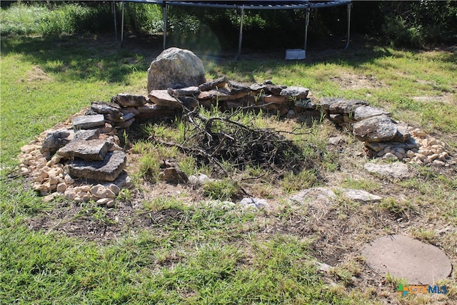 view of yard featuring a trampoline