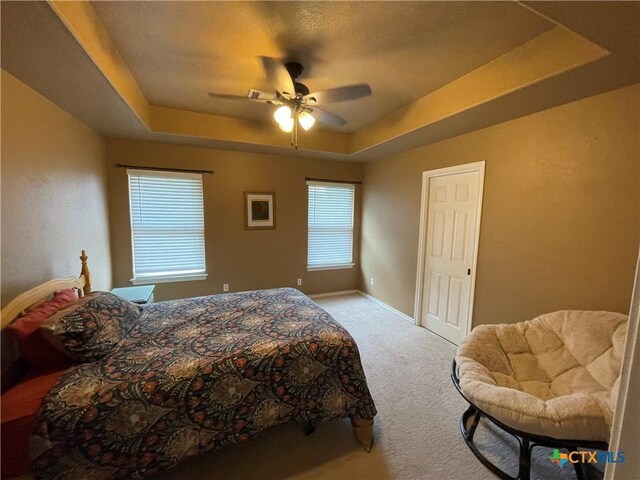 details featuring ceiling fan and a textured ceiling