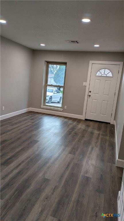 foyer featuring dark hardwood / wood-style floors