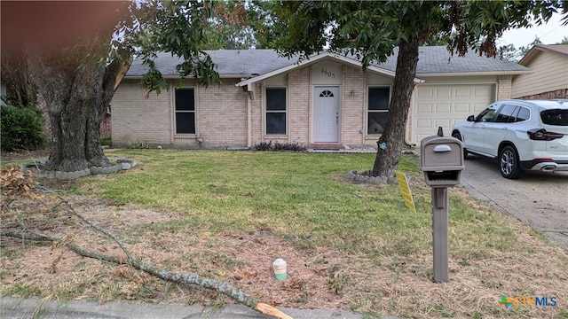 ranch-style home with a front lawn and a garage