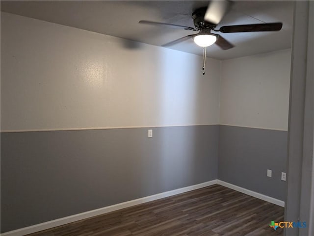 1201 Oblate Dr, Canyon Lake, TX 78133 - unfurnished room with a ceiling fan, dark wood-style flooring, and baseboards