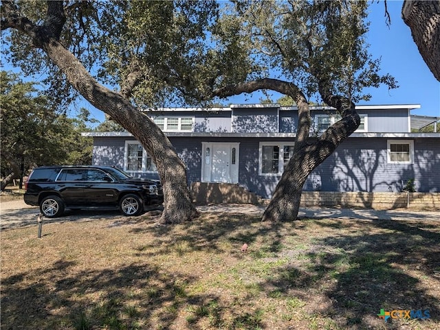 1201 Oblate Dr, Canyon Lake, TX 78133 - view of front of home with a front lawn and brick siding