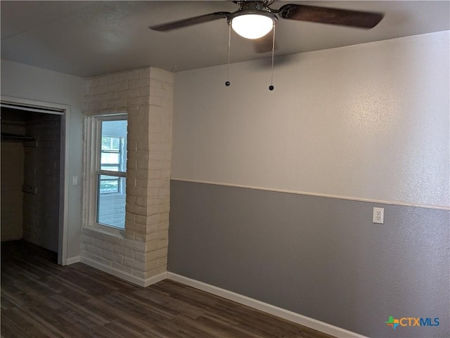 1201 Oblate Dr, Canyon Lake, TX 78133 - empty room with a ceiling fan, baseboards, and dark wood-style flooring