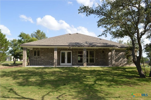 850 County Road 3152, Kempner, TX 76539 - back of property featuring french doors, brick siding, a lawn, and a shingled roof