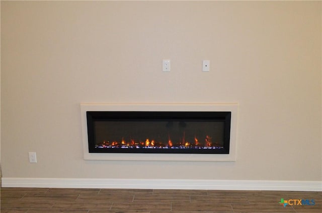850 County Road 3152, Kempner, TX 76539 - detailed view of wood finished floors and baseboards