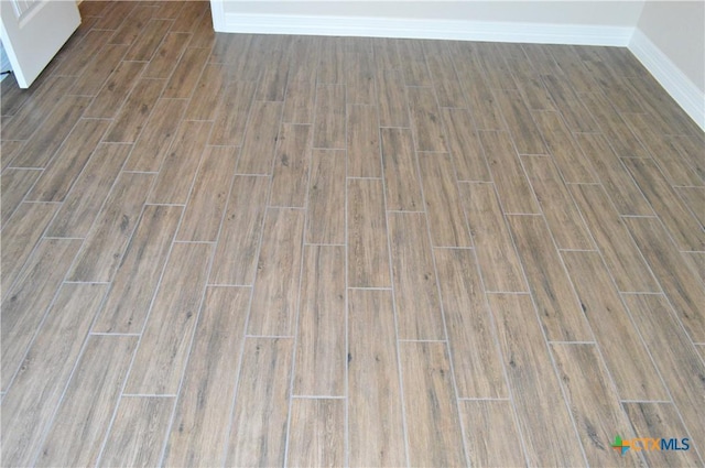 850 County Road 3152, Kempner, TX 76539 - detailed view of wood finished floors and baseboards
