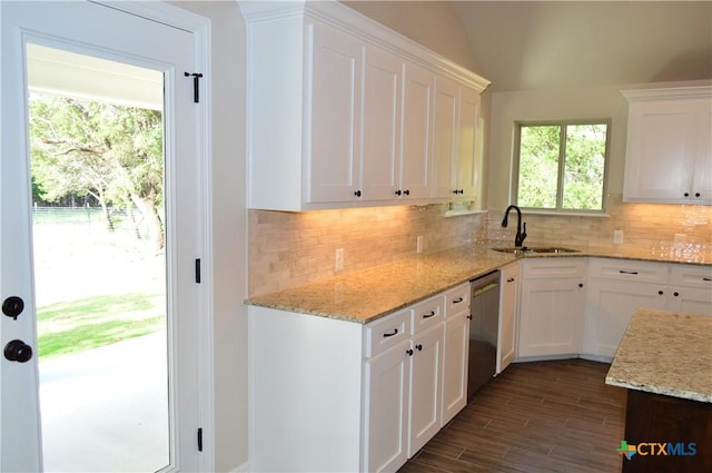 850 County Road 3152, Kempner, TX 76539 - kitchen with dishwasher, white cabinets, backsplash, light stone countertops, and dark wood-style flooring