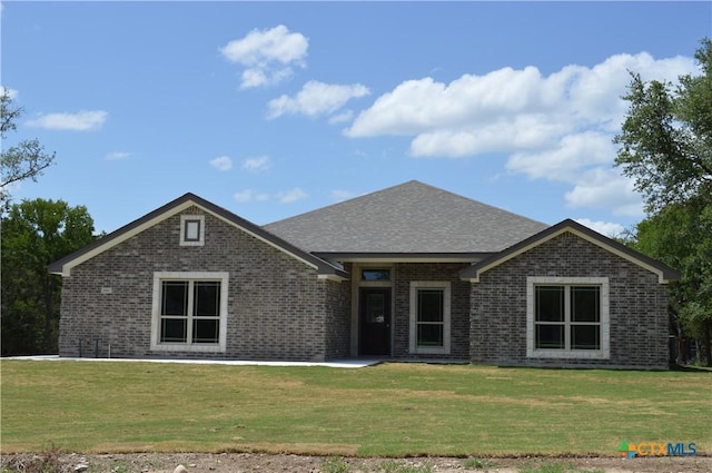 850 County Road 3152, Kempner, TX 76539 - view of front facade featuring brick siding and a front lawn