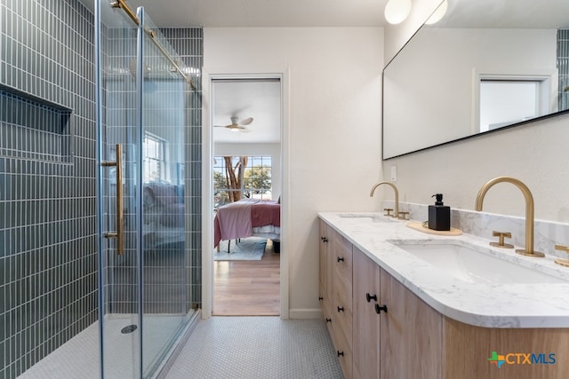 bathroom with vanity, tile patterned floors, and walk in shower