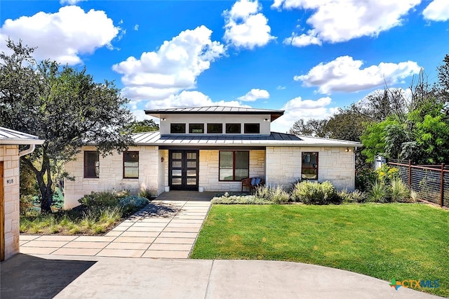 view of front of property with a front lawn