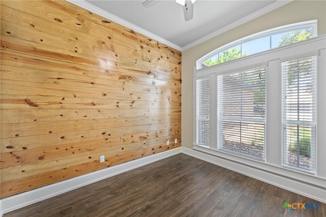 6319 Drexel Loop, Temple, TX 76502 - spare room with ornamental molding, dark wood-style flooring, and a ceiling fan