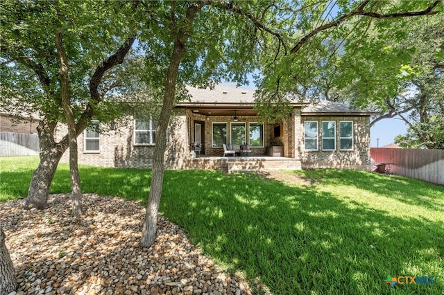 6319 Drexel Loop, Temple, TX 76502 - back of house featuring a patio area, brick siding, and a fenced backyard