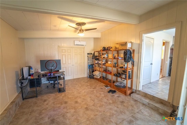 office with beam ceiling, a wall unit AC, and ceiling fan