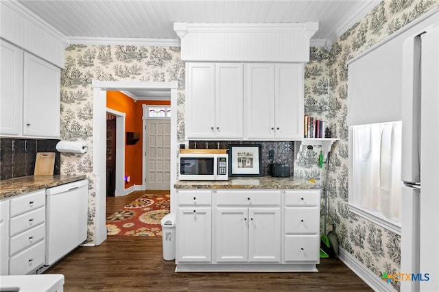 406 E Goodwin Ave, Victoria, TX 77901 - kitchen featuring white appliances, wallpapered walls, crown molding, dark wood-style flooring, and white cabinetry