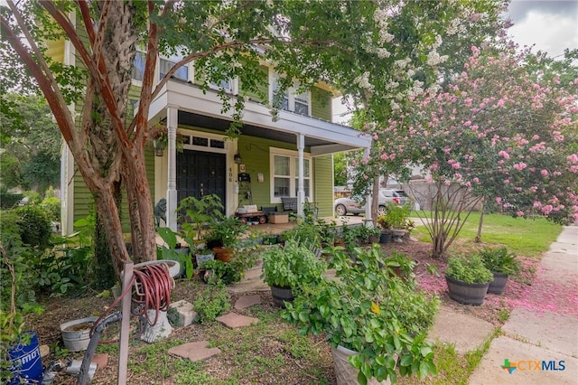 406 E Goodwin Ave, Victoria, TX 77901 - view of front facade with a porch