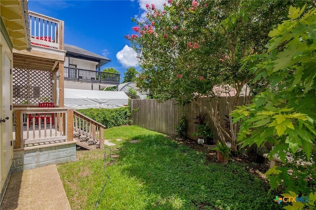 406 E Goodwin Ave, Victoria, TX 77901 - fenced yard featuring a balcony