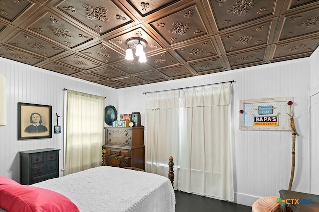 406 E Goodwin Ave, Victoria, TX 77901 - bedroom featuring an ornate ceiling and wood finished floors
