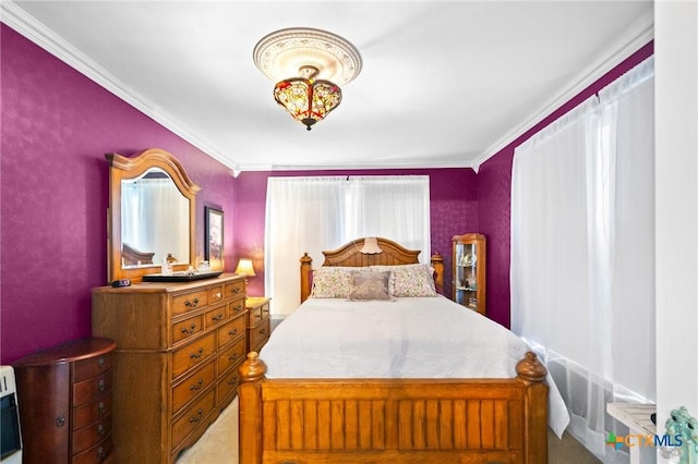 406 E Goodwin Ave, Victoria, TX 77901 - bedroom with crown molding and light colored carpet