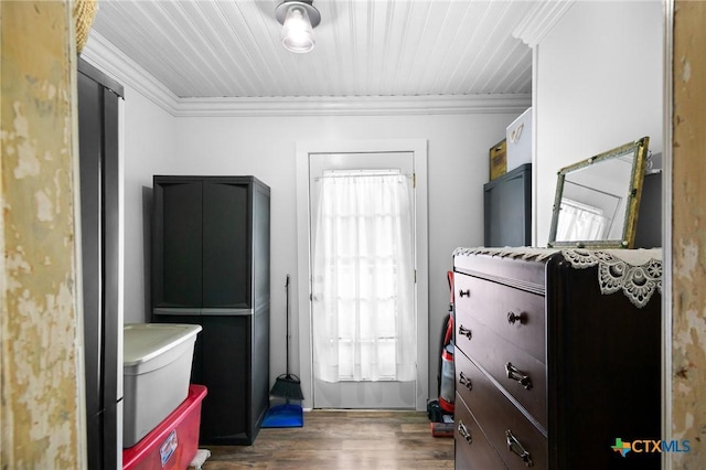 406 E Goodwin Ave, Victoria, TX 77901 - bedroom featuring crown molding, dark wood-style floors, and wood ceiling