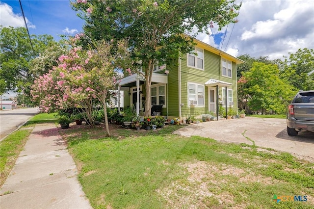 406 E Goodwin Ave, Victoria, TX 77901 - view of front of property featuring a front lawn