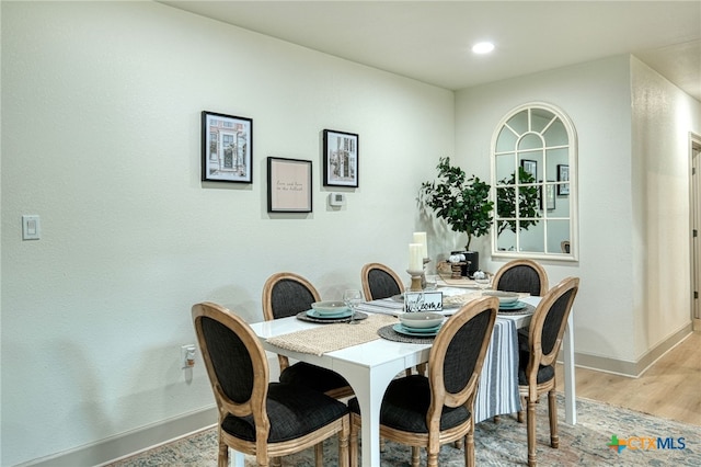 1606 Lone Man Mountain Rd, Wimberley, TX 78676 - dining area featuring baseboards, light wood-type flooring, and recessed lighting