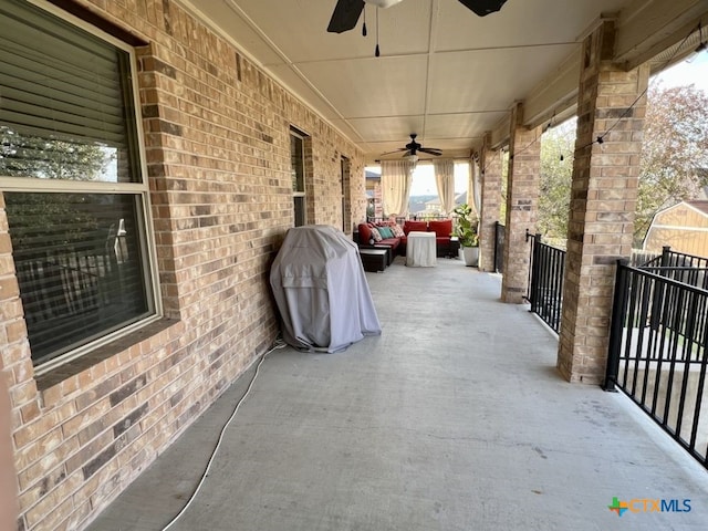 view of patio / terrace with ceiling fan and a grill