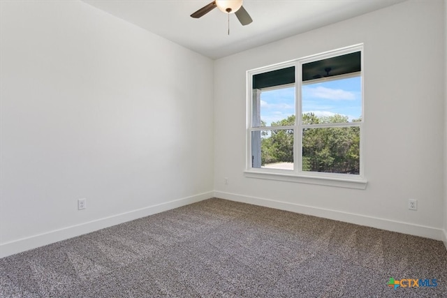 unfurnished room featuring carpet and ceiling fan