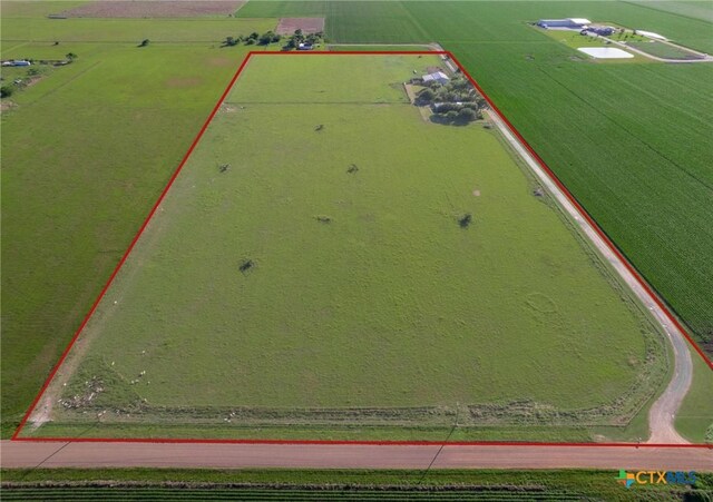 birds eye view of property featuring a rural view