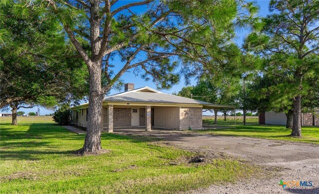 view of front of home with a front yard