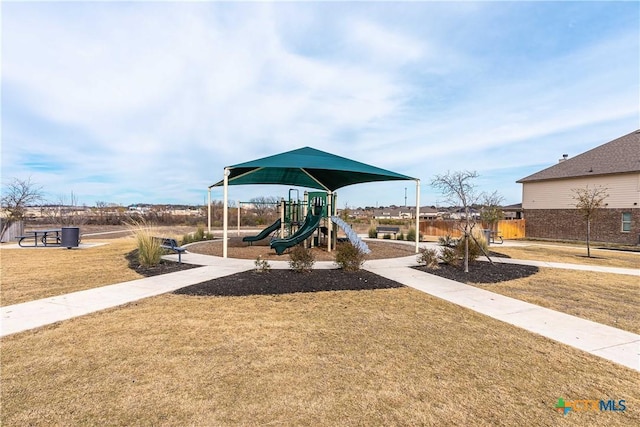 view of playground featuring a lawn