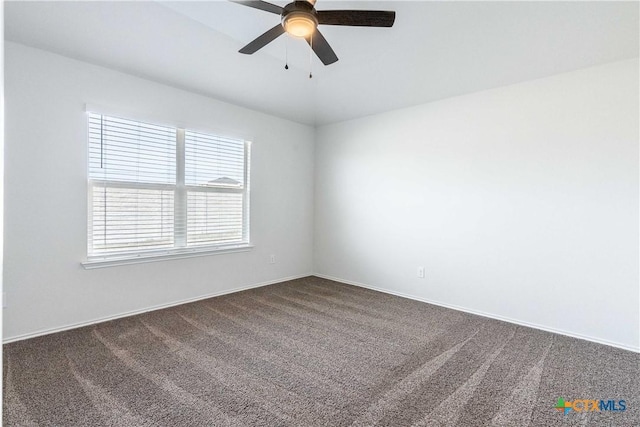 unfurnished room featuring ceiling fan, carpet, and lofted ceiling