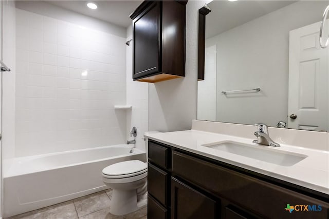 full bathroom with toilet, tile patterned flooring, vanity, and tub / shower combination