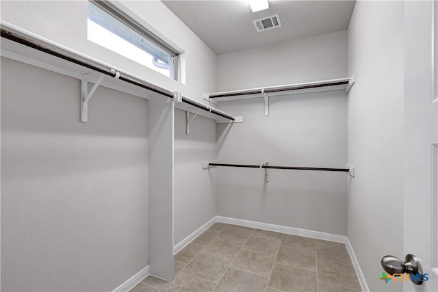 513 Foxbrook Way, Cibolo, TX 78108 - spacious closet with light tile patterned floors