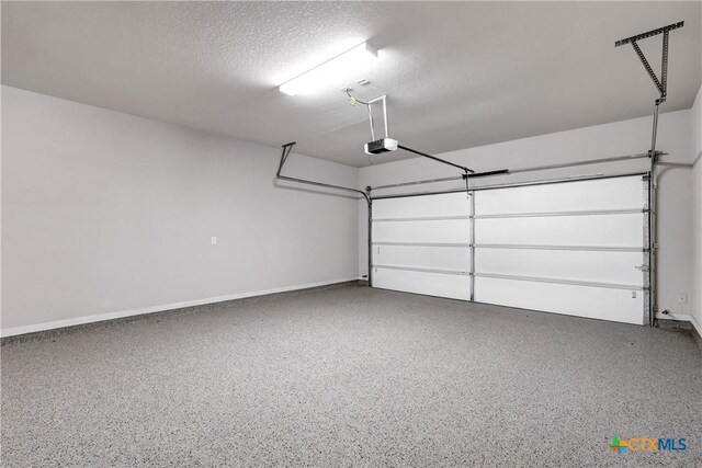 513 Foxbrook Way, Cibolo, TX 78108 - garage featuring a garage door opener and baseboards